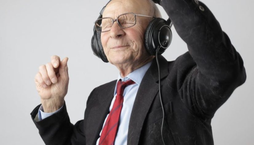 man in black jacket wearing black headphones