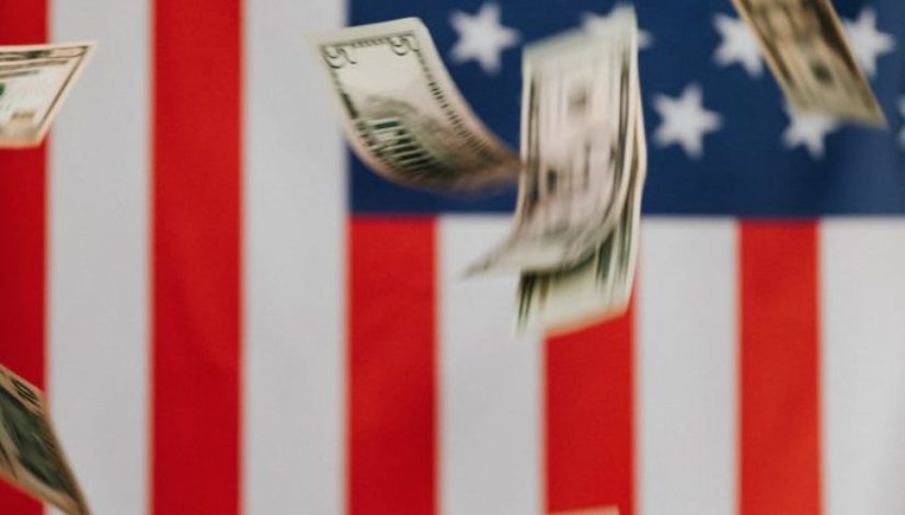 american flag and money falling down