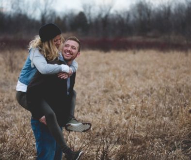 photo of a man carrying his partner