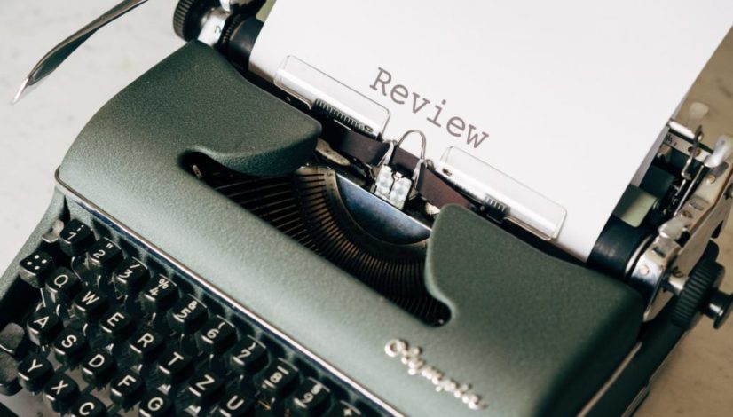 black and white typewriter on table